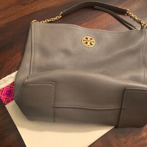 Tory Burch tan leather purse.